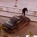 В Актау мужчина прыгал на припаркованном во дворе автомобиле