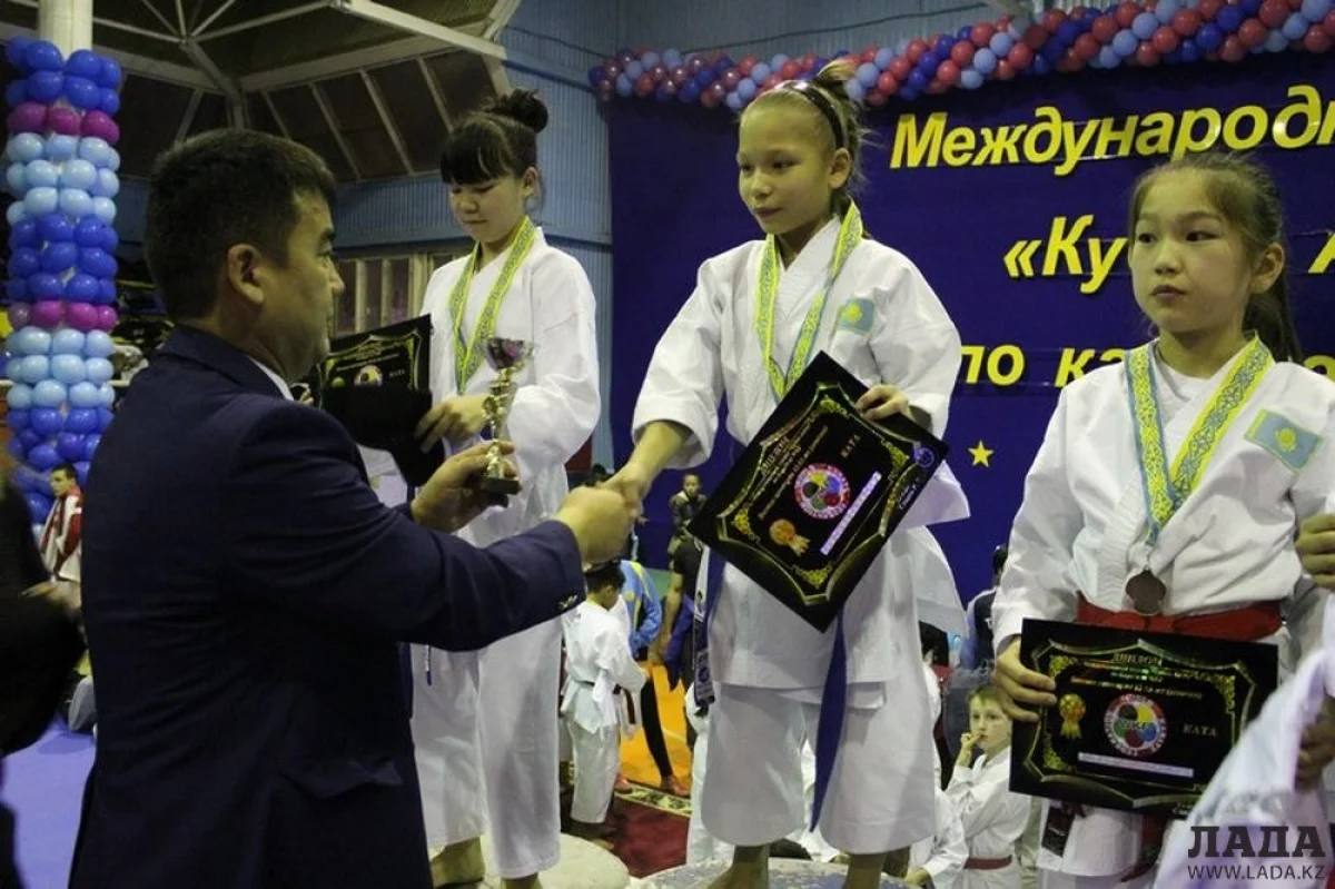 Юные спортсменки Мангистау во время награждения. Фото автора||news_pic_more|<!--TBegin--><a href="https://img.lada.kz/2015-12/1450704134_img_8257.jpg" onclick="return hs.expand(this)" ><img align="left" src="https://img.lada.kz/2015-12/thumbs/1450704134_img_8257.jpg" alt='Сборная Мангистауской области заняла первое место на международном турнире «Кубок Актау» по карате-до WKF' title='Сборная Мангистауской области заняла первое место на международном турнире «Кубок Актау» по карате-до WKF'  /></a><!--TEnd--><br /><!--TBegin--><a href="https://img.lada.kz/2015-12/1450704404_img_8109.jpg" onclick="return hs.expand(this)" ><img align="left" src="https://img.lada.kz/2015-12/thumbs/1450704404_img_8109.jpg" alt='Сборная Мангистауской области заняла первое место на международном турнире «Кубок Актау» по карате-до WKF' title='Сборная Мангистауской области заняла первое место на международном турнире «Кубок Актау» по карате-до WKF'  /></a><!--TEnd--><br /><!--TBegin--><a href="https://img.lada.kz/2015-12/1450704391_img_8155.jpg" onclick="return hs.expand(this)" ><img align="left" src="https://img.lada.kz/2015-12/thumbs/1450704391_img_8155.jpg" alt='Сборная Мангистауской области заняла первое место на международном турнире «Кубок Актау» по карате-до WKF' title='Сборная Мангистауской области заняла первое место на международном турнире «Кубок Актау» по карате-до WKF'  /></a><!--TEnd--><br /><!--TBegin--><a href="https://img.lada.kz/2015-12/1450704325_img_8168.jpg" onclick="return hs.expand(this)" ><img align="left" src="https://img.lada.kz/2015-12/thumbs/1450704325_img_8168.jpg" alt='Сборная Мангистауской области заняла первое место на международном турнире «Кубок Актау» по карате-до WKF' title='Сборная Мангистауской области заняла первое место на международном турнире «Кубок Актау» по карате-до WKF'  /></a><!--TEnd--><br /><!--TBegin--><a href="https://img.lada.kz/2015-12/1450704331_img_8304.jpg" onclick="return hs.expand(this)" ><img align="left" src="https://img.lada.kz/2015-12/thumbs/1450704331_img_8304.jpg" alt='Сборная Мангистауской области заняла первое место на международном турнире «Кубок Актау» по карате-до WKF' title='Сборная Мангистауской области заняла первое место на международном турнире «Кубок Актау» по карате-до WKF'  /></a><!--TEnd--><br /><!--TBegin--><a href="https://img.lada.kz/2015-12/1450704355_img_8407.jpg" onclick="return hs.expand(this)" ><img align="left" src="https://img.lada.kz/2015-12/thumbs/1450704355_img_8407.jpg" alt='Сборная Мангистауской области заняла первое место на международном турнире «Кубок Актау» по карате-до WKF' title='Сборная Мангистауской области заняла первое место на международном турнире «Кубок Актау» по карате-до WKF'  /></a><!--TEnd--><br /><!--TBegin--><a href="https://img.lada.kz/2015-12/1450704331_img_8512.jpg" onclick="return hs.expand(this)" ><img align="left" src="https://img.lada.kz/2015-12/thumbs/1450704331_img_8512.jpg" alt='Сборная Мангистауской области заняла первое место на международном турнире «Кубок Актау» по карате-до WKF' title='Сборная Мангистауской области заняла первое место на международном турнире «Кубок Актау» по карате-до WKF'  /></a><!--TEnd--><br /><!--TBegin--><a href="https://img.lada.kz/2015-12/1450704391_img_8515.jpg" onclick="return hs.expand(this)" ><img align="left" src="https://img.lada.kz/2015-12/thumbs/1450704391_img_8515.jpg" alt='Сборная Мангистауской области заняла первое место на международном турнире «Кубок Актау» по карате-до WKF' title='Сборная Мангистауской области заняла первое место на международном турнире «Кубок Актау» по карате-до WKF'  /></a><!--TEnd--><br /><!--TBegin--><a href="https://img.lada.kz/2015-12/1450704390_img_8536.jpg" onclick="return hs.expand(this)" ><img align="left" src="https://img.lada.kz/2015-12/thumbs/1450704390_img_8536.jpg" alt='Сборная Мангистауской области заняла первое место на международном турнире «Кубок Актау» по карате-до WKF' title='Сборная Мангистауской области заняла первое место на международном турнире «Кубок Актау» по карате-до WKF'  /></a><!--TEnd--><br /><!--TBegin--><a href="https://img.lada.kz/2015-12/1450704345_img_8550.jpg" onclick="return hs.expand(this)" ><img align="left" src="https://img.lada.kz/2015-12/thumbs/1450704345_img_8550.jpg" alt='Сборная Мангистауской области заняла первое место на международном турнире «Кубок Актау» по карате-до WKF' title='Сборная Мангистауской области заняла первое место на международном турнире «Кубок Актау» по карате-до WKF'  /></a><!--TEnd--><br /><!--TBegin--><a href="https://img.lada.kz/2015-12/1450704423_img_8613.jpg" onclick="return hs.expand(this)" ><img align="left" src="https://img.lada.kz/2015-12/thumbs/1450704423_img_8613.jpg" alt='Сборная Мангистауской области заняла первое место на международном турнире «Кубок Актау» по карате-до WKF' title='Сборная Мангистауской области заняла первое место на международном турнире «Кубок Актау» по карате-до WKF'  /></a><!--TEnd--><br /><!--TBegin--><a href="https://img.lada.kz/2015-12/1450704343_img_8618.jpg" onclick="return hs.expand(this)" ><img align="left" src="https://img.lada.kz/2015-12/thumbs/1450704343_img_8618.jpg" alt='Сборная Мангистауской области заняла первое место на международном турнире «Кубок Актау» по карате-до WKF' title='Сборная Мангистауской области заняла первое место на международном турнире «Кубок Актау» по карате-до WKF'  /></a><!--TEnd-->