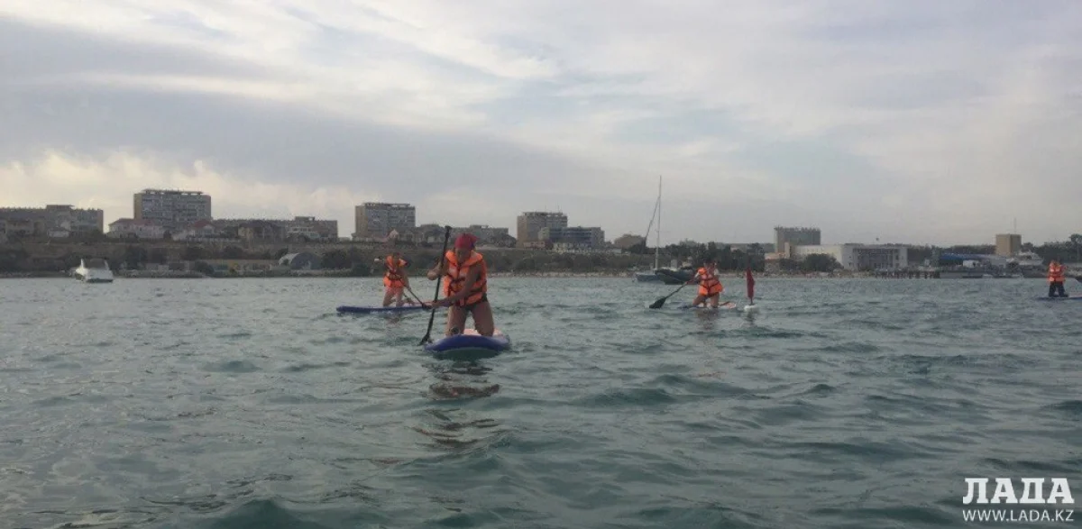 Участники соревнований по SUP-Surfing