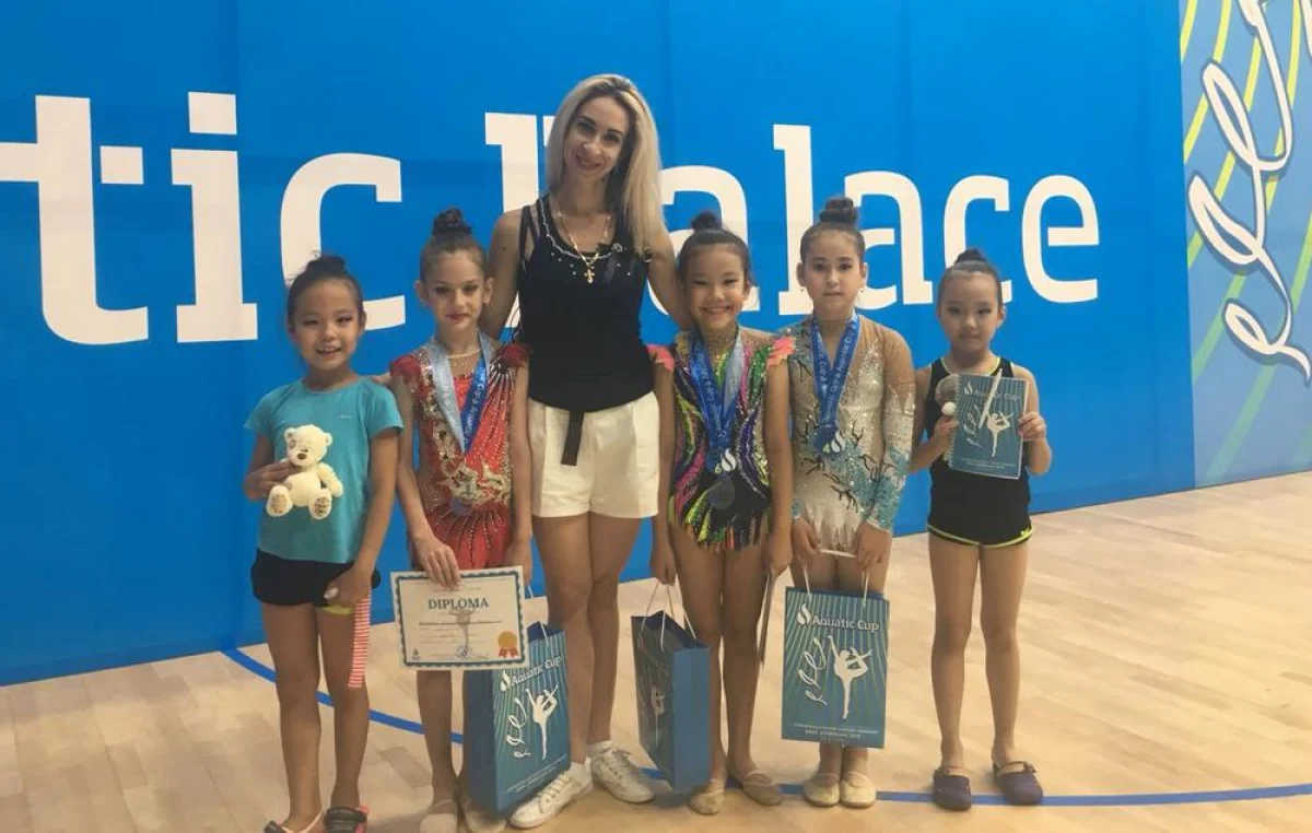 Победительницы турнира. Фото предоставлено участниками соревнований||news_pic_more|<!--TBegin--><a href="https://www.lada.kz/uploads/posts/2018-06/1529383062_05d6ff81-0eaf-4e1b-8b6f-956deb76aefc.jpg" onclick="return hs.expand(this)" ><img align="left" src="https://www.lada.kz/uploads/posts/2018-06/thumbs/1529383062_05d6ff81-0eaf-4e1b-8b6f-956deb76aefc.jpg" alt='Юные гимнастки из Актау завоевали пять медалей на международном турнире в Баку' title='Юные гимнастки из Актау завоевали пять медалей на международном турнире в Баку'  /></a><!--TEnd--><br /><!--TBegin--><a href="https://www.lada.kz/uploads/posts/2018-06/1529383069_5ccda9cc-ef25-4bd5-9556-bdf98288ae3b.jpg" onclick="return hs.expand(this)" ><img align="left" src="https://www.lada.kz/uploads/posts/2018-06/thumbs/1529383069_5ccda9cc-ef25-4bd5-9556-bdf98288ae3b.jpg" alt='Юные гимнастки из Актау завоевали пять медалей на международном турнире в Баку' title='Юные гимнастки из Актау завоевали пять медалей на международном турнире в Баку'  /></a><!--TEnd--><br /><!--TBegin--><a href="https://www.lada.kz/uploads/posts/2018-06/1529383087_27c51a1c-f10a-415e-9f98-f13bcd955657.jpg" onclick="return hs.expand(this)" ><img align="left" src="https://www.lada.kz/uploads/posts/2018-06/thumbs/1529383087_27c51a1c-f10a-415e-9f98-f13bcd955657.jpg" alt='Юные гимнастки из Актау завоевали пять медалей на международном турнире в Баку' title='Юные гимнастки из Актау завоевали пять медалей на международном турнире в Баку'  /></a><!--TEnd--><br /><!--TBegin--><a href="https://www.lada.kz/uploads/posts/2018-06/1529383088_a0c568cd-88b5-4cab-bea0-173959ba4020.jpg" onclick="return hs.expand(this)" ><img align="left" src="https://www.lada.kz/uploads/posts/2018-06/thumbs/1529383088_a0c568cd-88b5-4cab-bea0-173959ba4020.jpg" alt='Юные гимнастки из Актау завоевали пять медалей на международном турнире в Баку' title='Юные гимнастки из Актау завоевали пять медалей на международном турнире в Баку'  /></a><!--TEnd-->