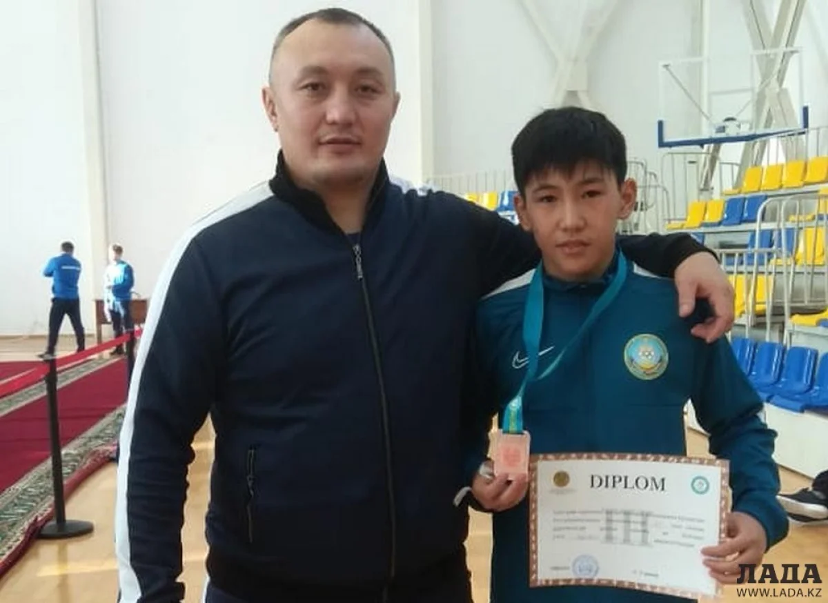 Бурибай Кобен со своим тренером из Нур-Султана