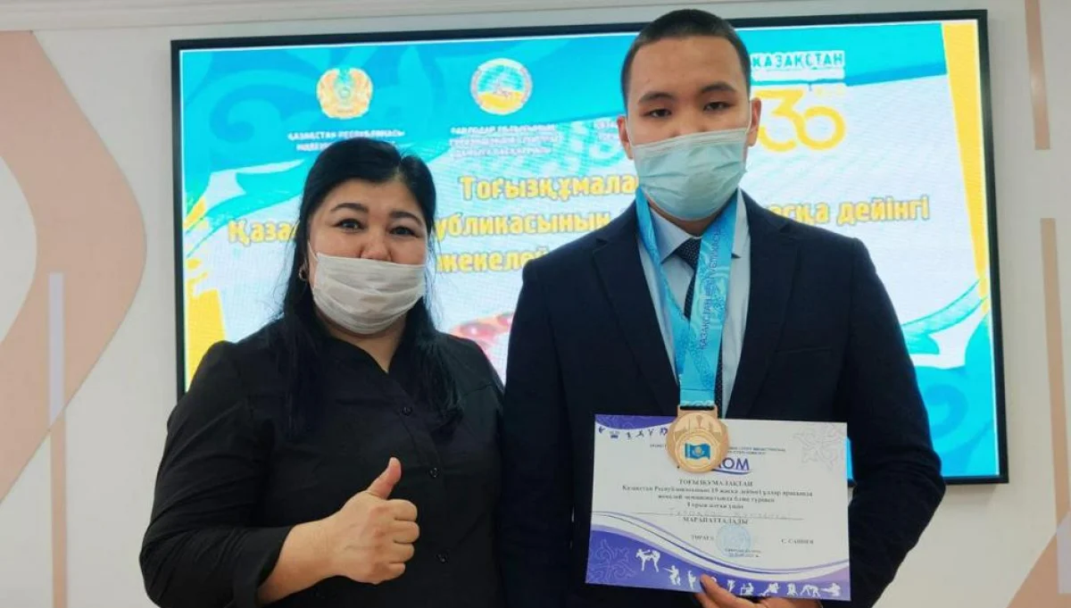 Чемпион с тренером. Фото предоставлено Г.Жакиевой