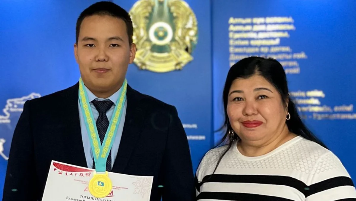 Чемпион с тренером. Фото предоставлено Г.Жакиевой