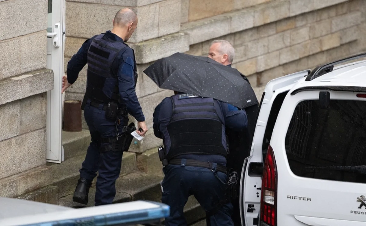 Жоэль ле Скуарнек прибывает в зал суда (Фото: Raphael Lafargue / ABACAPRESS.COM / ТАСС)