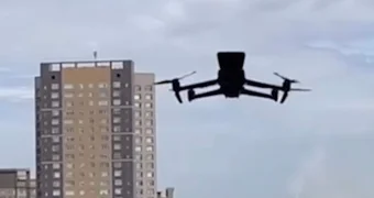 В Астане дрон попросил женщину закрыть окно во время парада