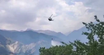 Вертолет подключили к тушению пожара в ущелье в Алматинской области