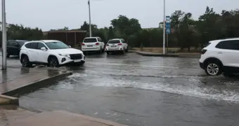 Жители Актау жалуются на огромную лужу, которая образуется у остановки после дождей