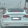 Tesla  на газу: фото электромобиля со знаком «GAS» позабавило жителей Актау