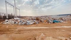 Мусорная свалка, на участке позади магазина Мастер дом, перед ГПП «Хазар».