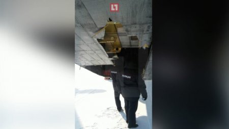 Золотые слитки высыпались с борта взлетающего самолета